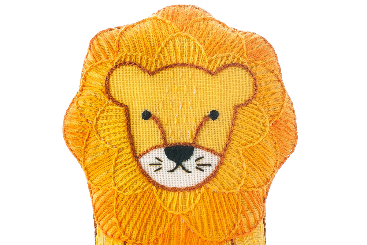 Orange lion head on a white background