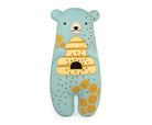 Toy bear with a beehive on a white background