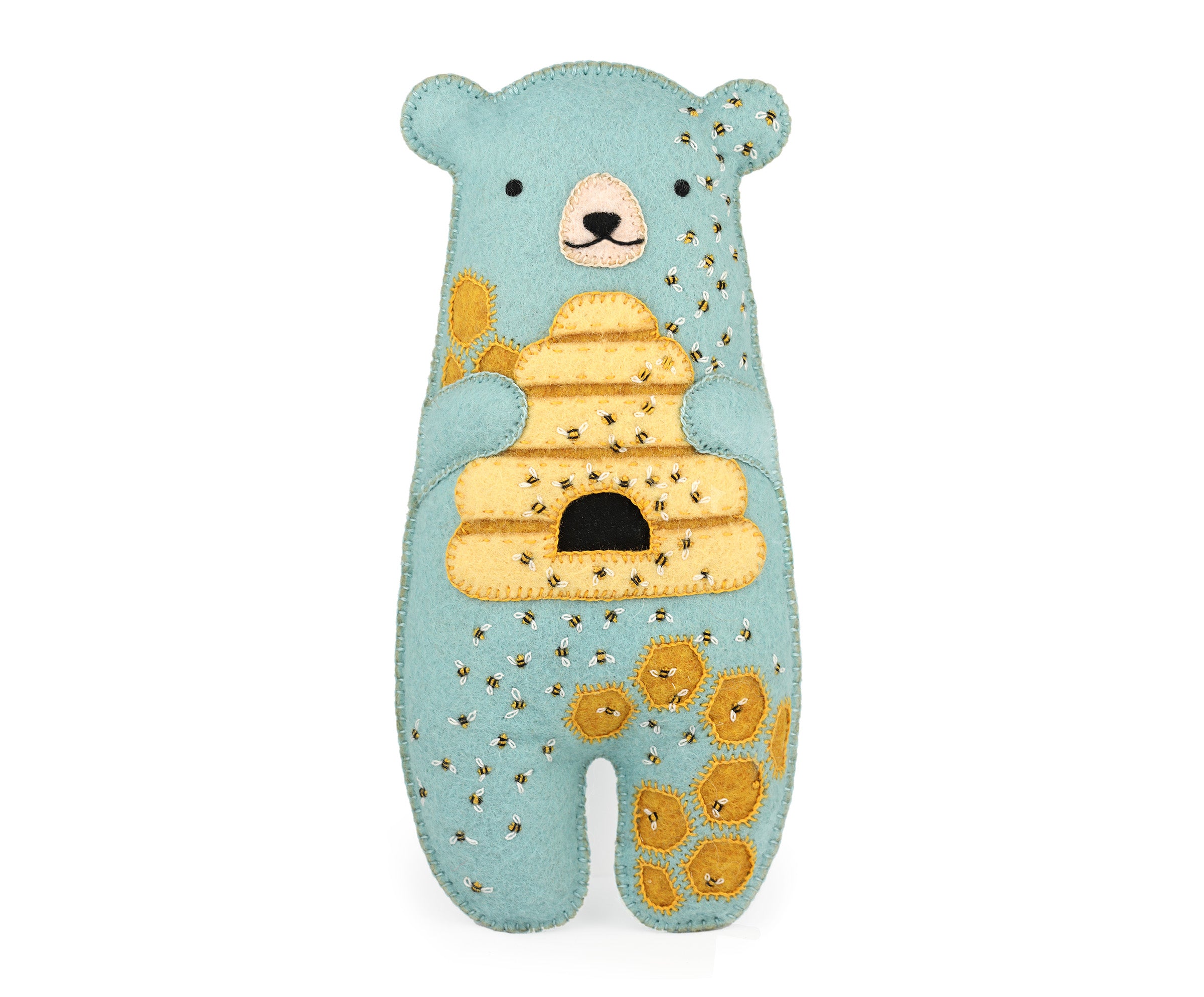 Toy bear with a beehive on a white background